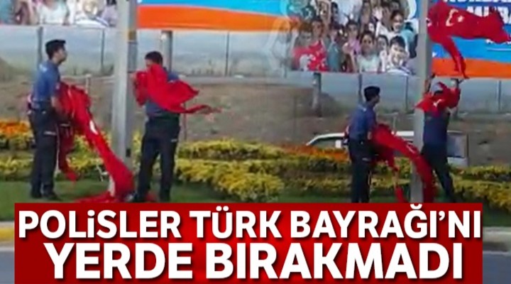 Polisler Türk Bayrağını yerde bırakmadı